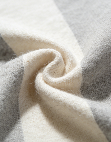 High quality cashmere fabric texture showing fine knit and softness