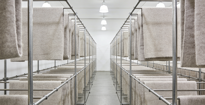 rows of wool product on racks